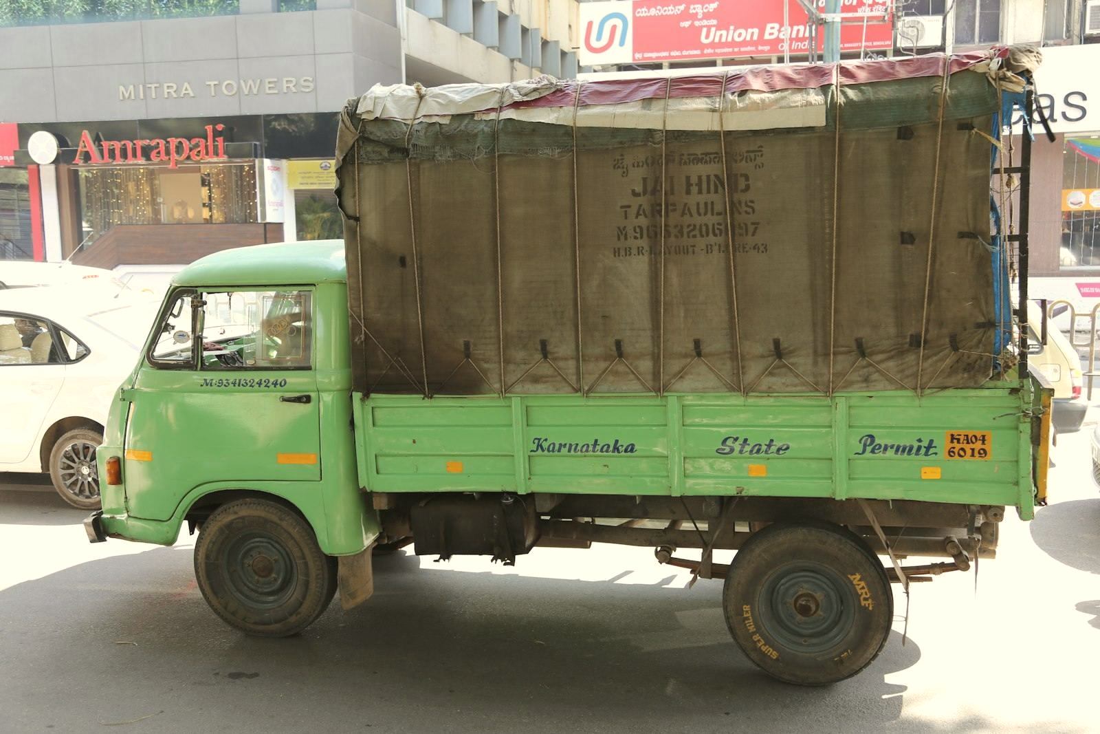 Indian goods truck with a covered load