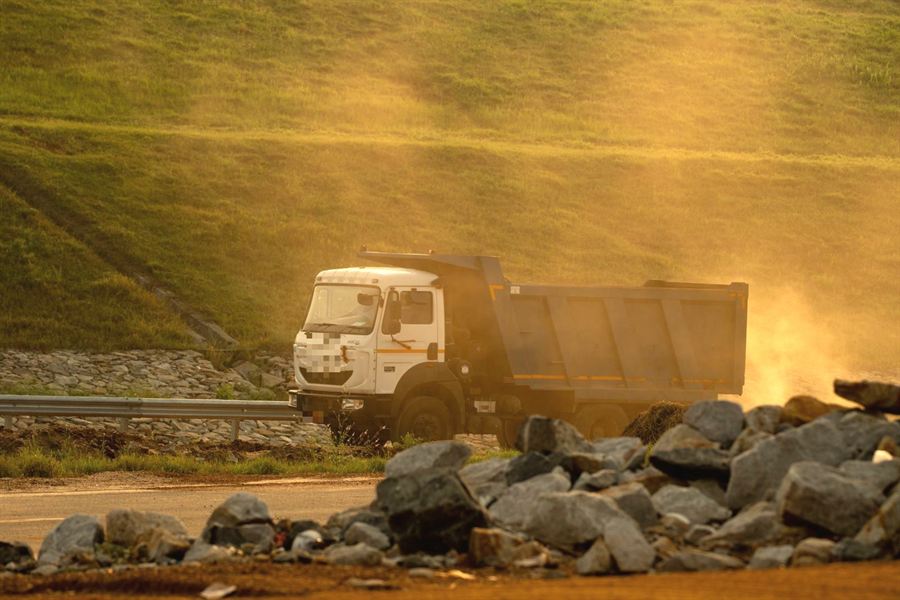 Tipper truck at a mine at golden hour